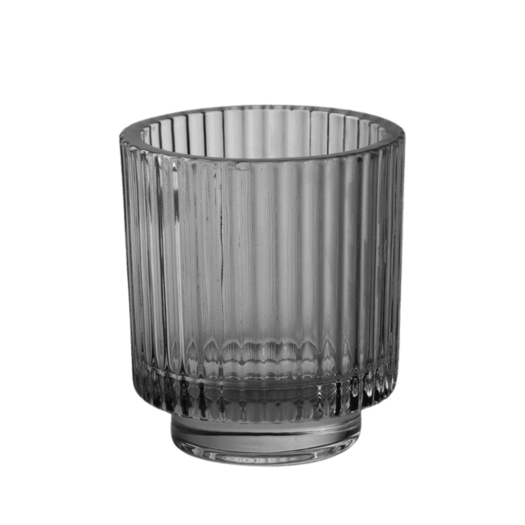 Zwarte glazen kaarshouder met geribbeld glas, verkrijgbaar in meerdere kleuren en ideaal voor gebruik met kaarsenzand.