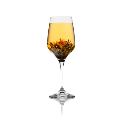 Bloeiende theebloem Butterfly Long For Flower met kleurrijke bloemen in glas