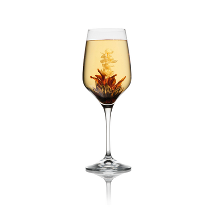 Bloeiende theebloem Lily Fairy met lelie en jasmijn in glas