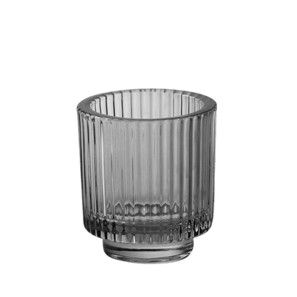 Zwarte glazen kaarshouder met geribbeld glas, verkrijgbaar in meerdere kleuren en ideaal voor gebruik met kaarsenzand.