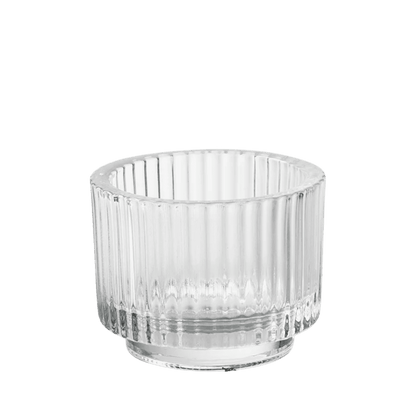 Transparante glazen kaarshouder met geribbeld glas, verkrijgbaar in meerdere kleuren en ideaal voor gebruik met kaarsenzand.
